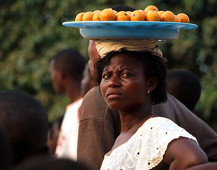 African Lady Selling Oranges