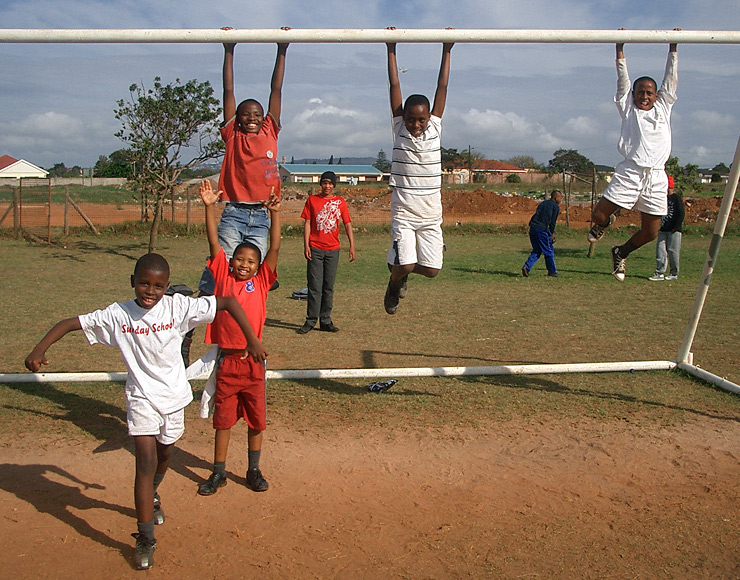 Kids Swing from Football Goal Posts