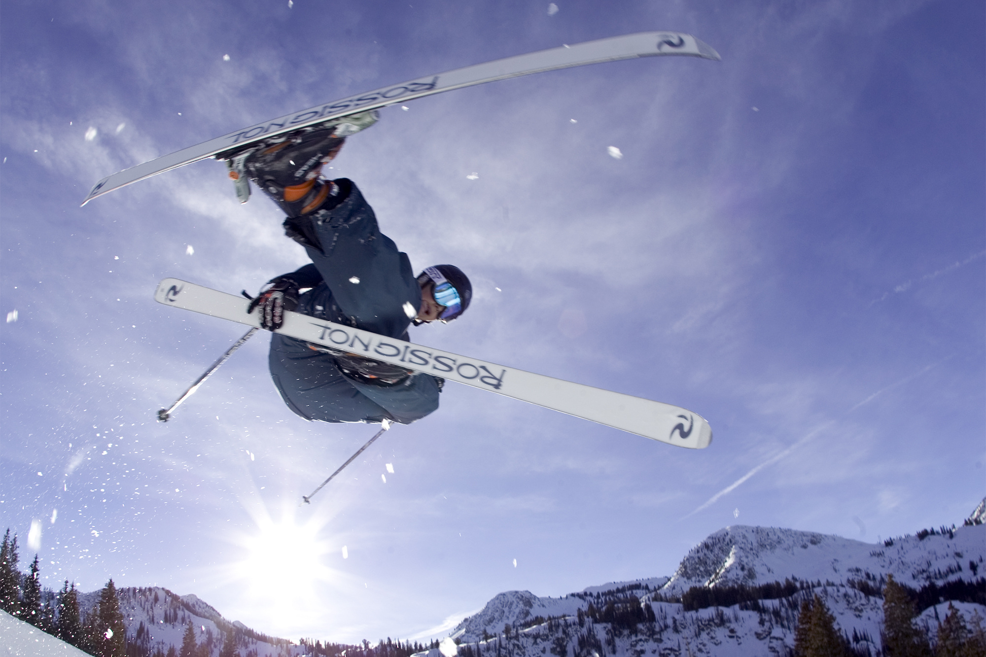 Skier in Canada jumping through the air