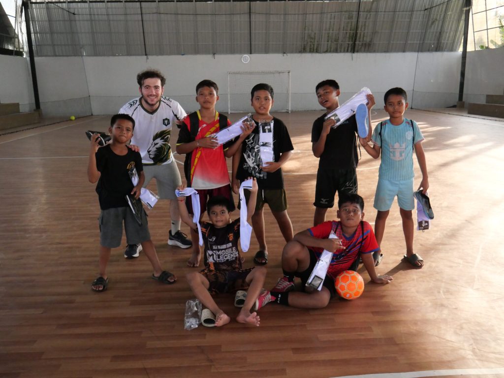 Group of kids doing sport in Lovina, Bali